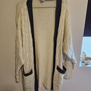 White and black LuLaRoe sweater.